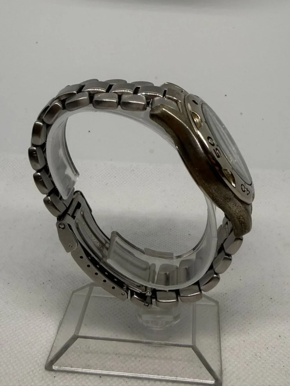 Armitron Men's SS Rotating Bezel Dark Grey Dial Day Date Bracelet Quartz Watch